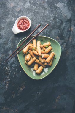 Bebek Mısır Mançurya kuru - popüler Hindi-çin başlangıç tarifi. seçici odaklama