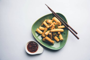 Bebek Mısır Mançurya kuru - popüler Hindi-çin başlangıç tarifi. seçici odaklama