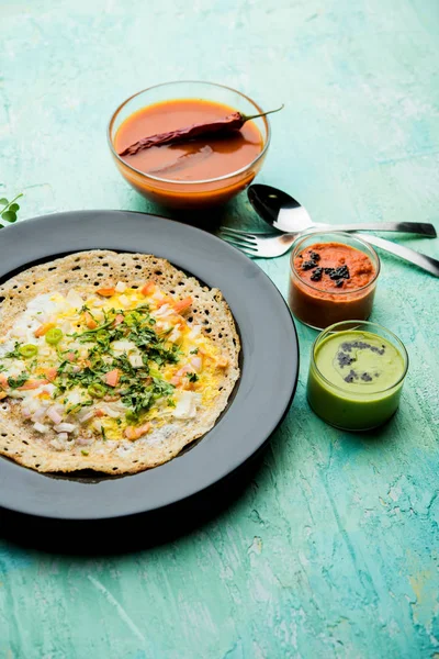Egg Dosa is a popular south indian non-vegetarian breakfast or meal, served with sambar and chutney