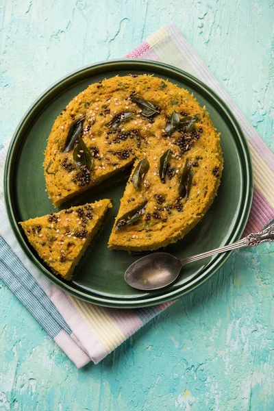 Handvo/handwa is a vegetable cake originating from the Gujarat, India. selective focus