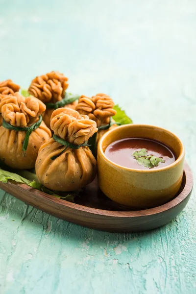 Crispy Potli Samosa or veg money bags are delicious Indian snacks of spiced aloo and mix veggies Or Meat/kheema  stuffed in flaky dough. It\'s a great creative starter or appetiser. served with ketchup