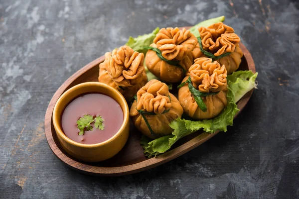 Crispy Potli Samosa or veg money bags are delicious Indian snacks of spiced aloo and mix veggies Or Meat/kheema  stuffed in flaky dough. It\'s a great creative starter or appetiser. served with ketchup