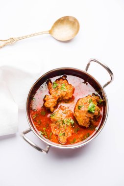 Lauki kofta Curry, bottel gourd veya Doodhi kullanılarak yapılmış, bir kase veya karahi hizmet vermektedir. seçici odak