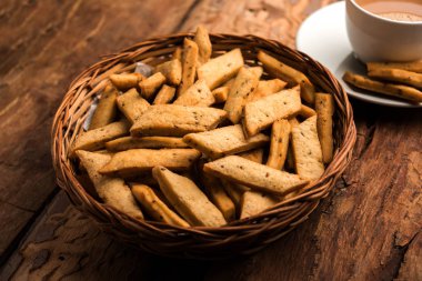Namakpare veya Tuzlu Shakarpara veya shakarpare veya namkeen Shankarpali, gujarat, Hindistan popüler diwali gıda veya çay-saat snack