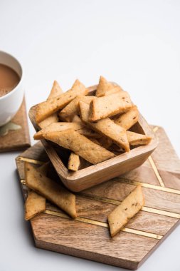 Namakpare veya Tuzlu Shakarpara veya shakarpare veya namkeen Shankarpali, gujarat, Hindistan popüler diwali gıda veya çay-saat snack