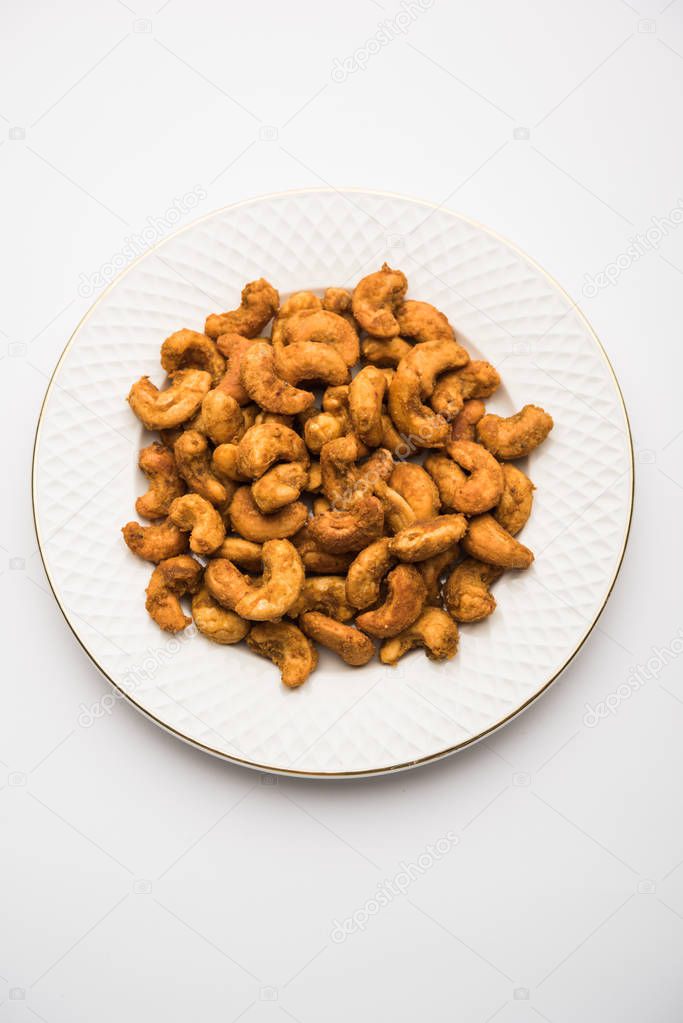 Kaju Pakoda/pakora OR Cashew Nut Fritters, is a tasty snack from India, served as Chakna