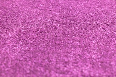 Pembe ve beyaz tüylü halı, doku. Sığ alan derinliğiyle odaklan.