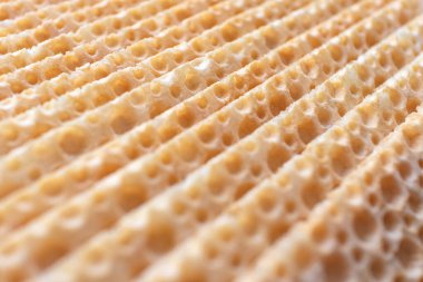 Bir grup kuru waffle 'ın soyut arkaplanı, yakın plan, seçici odak, doku.