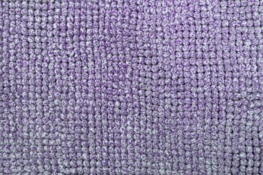 Yumuşak mavi flanel halının bulanık dokusu. Bir bal peteğinin yumuşak arkaplanı.