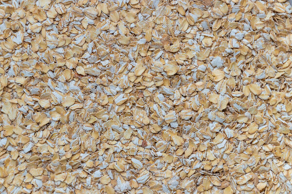 Текстурная овсянка, вид сверху, фон.