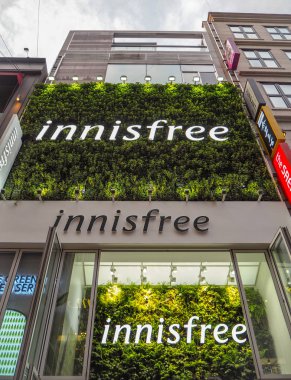 October 2018 - Seoul, South Korea: Large store of the South Korean skincare brand Innisfree in Seoul's main shopping area Myeong-dong clipart