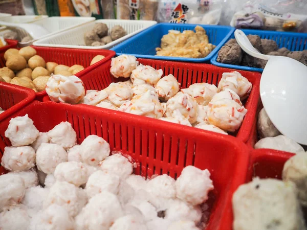 Siu mai, stinky tofu and fish balls in small containers sold at a street food stall in central Hong Kong