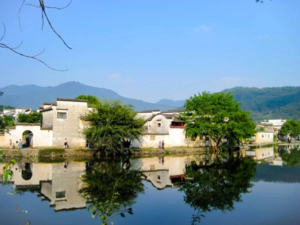 Unesco listed Hongcun old village with traditional Huizhou architecture in spring with clear blue sky. Hongcun is located in Anhui near Huangshan.