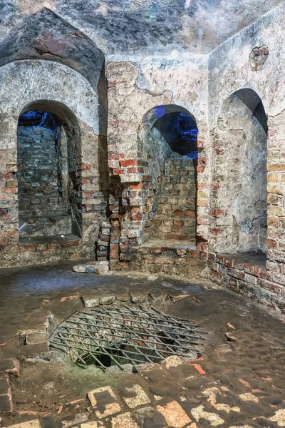 Ancient catacombs - stone arches with stairs.