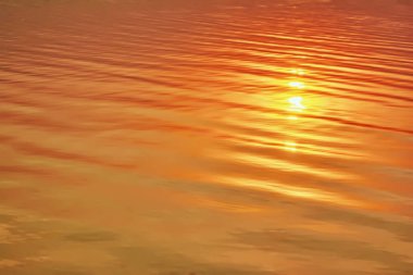 Arka plan - su doku küçük dalgalar halinde günbatımı ışınları ile.