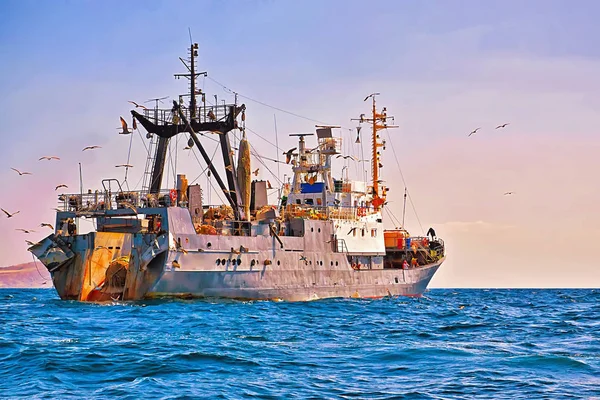 Fishing seiner in the open sea close-up.