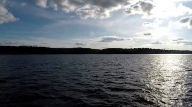 Hava güneşli bir plaj su yüzeyi, tripsin açık ve bu kombine withseaand üzerinde çekim