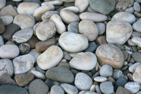 な形状 サイズ キプロスのパフォスの Petra Tou Romiou ビーチ上のテクスチャの小石 — ストック写真