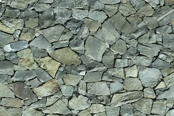 Close Uma Parede Pedra Natural Exterior Cinza Luz Solar — Fotografia de Stock