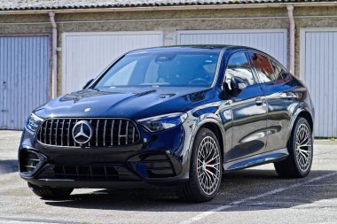 Neu-Ulm, Germany - Septermber, 6, 2025: Mercedes AMG GLC Coupe parking at the backyard.