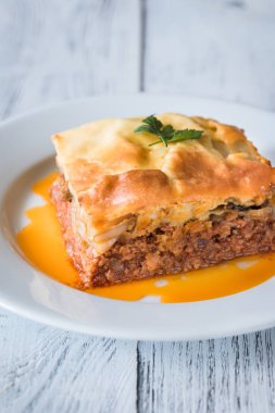 Musakka bölümünü kapat