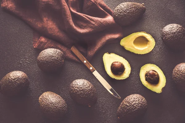 Hass avocados on the dark background — Stock Photo, Image