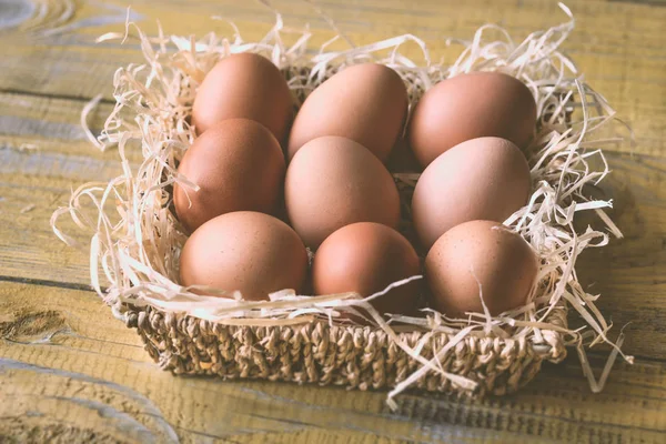 Basket Raw Chicken Eggs Wooden Background — Stock Photo, Image