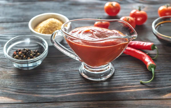 Barbecue sauce in gravy boat — Stock Photo, Image