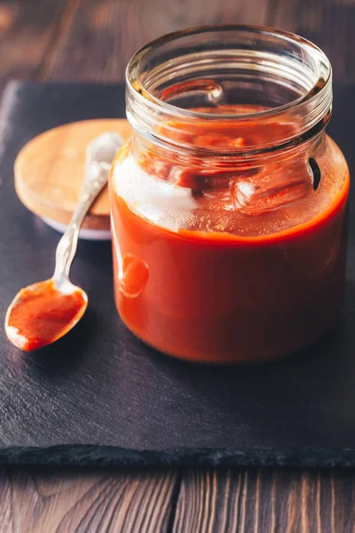 Barbecue sauce in the glass jar — Stock Photo, Image