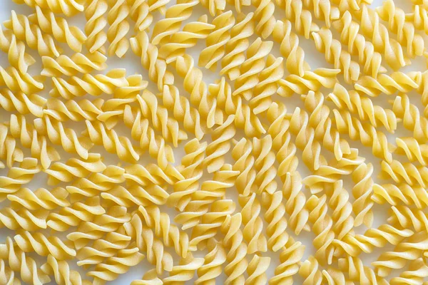 Raw fusilli pasta — Stock Photo, Image