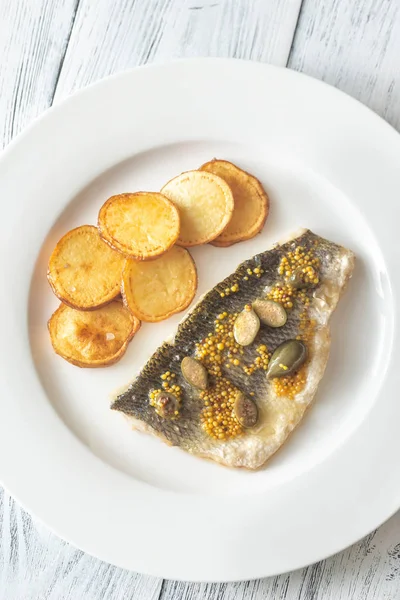 Baked sea bass with capers — Stock Photo, Image