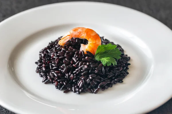 Black wholegrain rice with shrimp — Stock Photo, Image