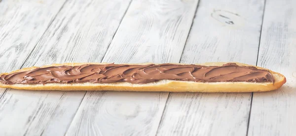 Baguette dengan krim cokelat — Stok Foto