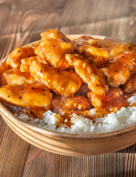 Bowl of orange chicken — Stok Foto