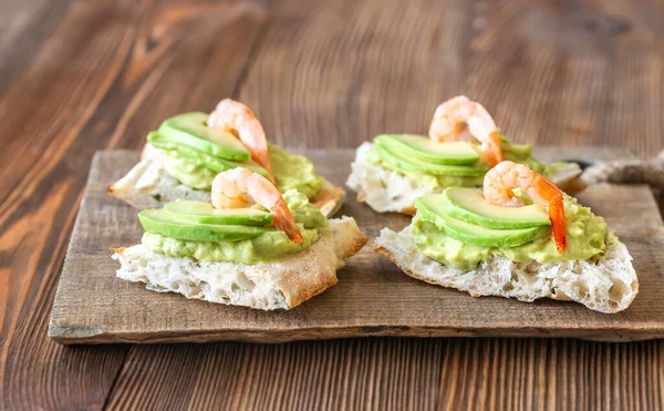 Sandwiches with avocado and shrimps