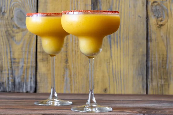 Glasses Frozen Mango Margarita Cocktails Garnished Paprika Salt Rim — Stock Photo, Image