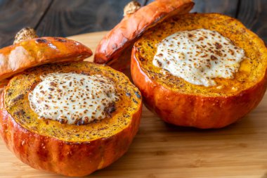 Golden Hokkaido pumpkins stuffed with savory beef, topped with melted mozzarella