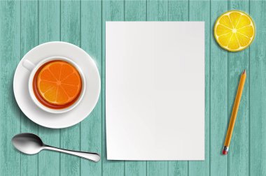 Boş beyaz kağıdın bir tablo. Limonlu çay bir fincan