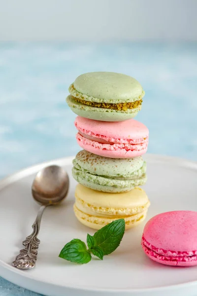 Colorful macarons cakes. Small French cakes. Sweet and colorful french macaroons.