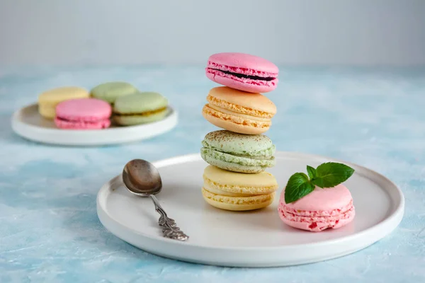 Colorful macarons cakes. Small French cakes. Sweet and colorful french macaroons.