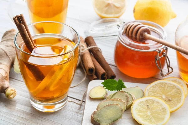 Cup of ginger tea with honey and lemon.
