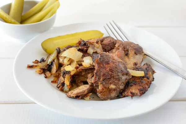 Fried chicken liver with onions and herbs