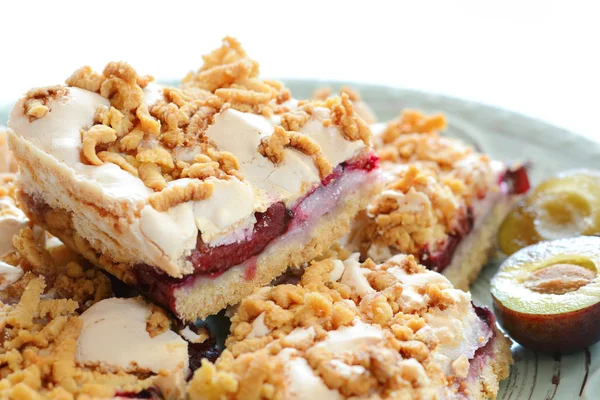 Plum cake. Homemade shortcrust pastry with purple plums.
