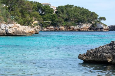 Plaj Cala Ferrera, Mallorca güney-doğusunda popüler bir aile hedef. İspanya