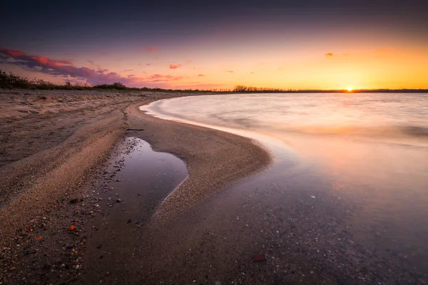 Baltic sea beach during sunset in Rewa. Baltic Sea. Poland