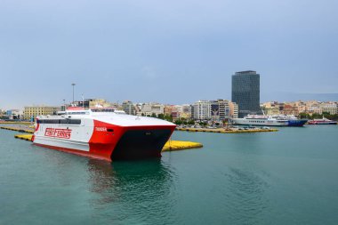 Piraeus, Greece - May 13, 2024: The ferry Thunder, one of the vessels of the company Fast Ferries, in the port of Piraeus. Greece