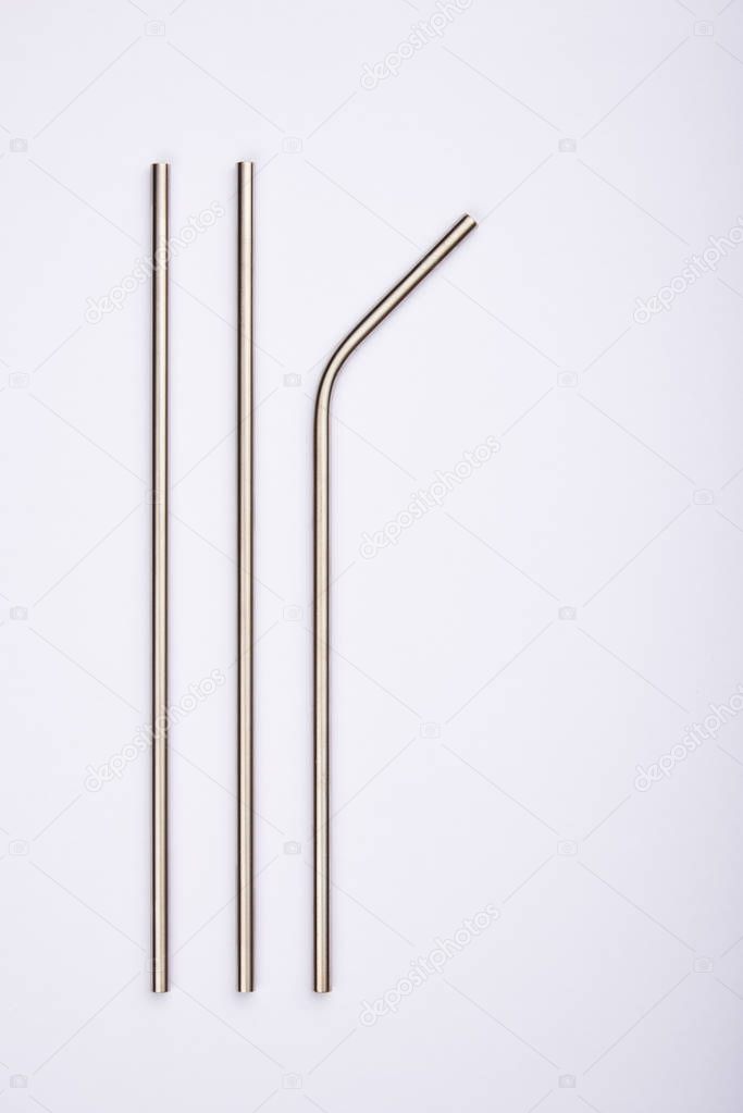 reusable stainless steel straws, isolated on white