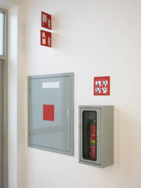fire hydrant and fire exhauster on the wall 