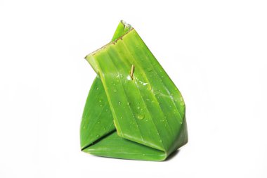 Beyaz arkaplanda yeşil muz yaprağı izole