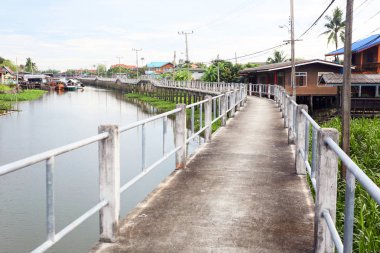 old bridge and river in rural village